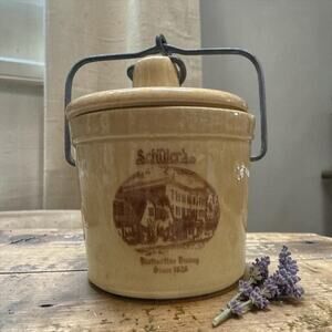 Vintage Win Schuler's stoneware ceramic cheese crock with wire bail handle.